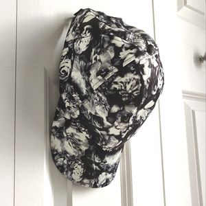 Le Chateau satin black and white floral baseball hat
